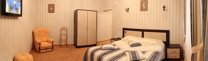 Luxury room at the Cleopatra Hotel in Kamenets-Podolsky. Book by promotion