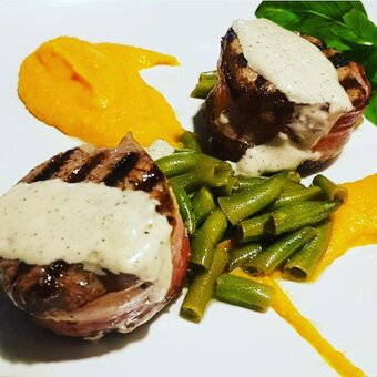 Italian cuisine at the parmesan restaurant in mariupol. book with a discount
