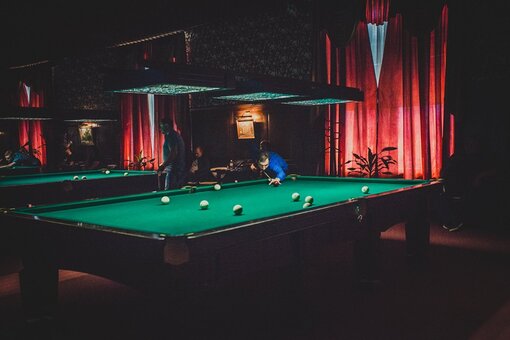 Playing billiards at the persona lounge club in odessa. book for a promotion.