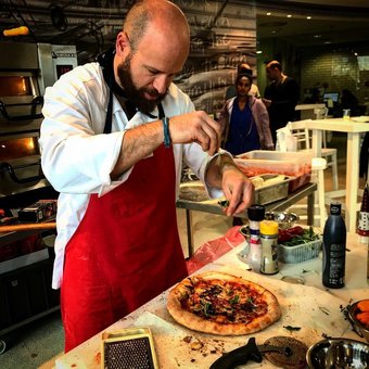 Masters of Italian cuisine from the pizzeria "Home pizzeria" in Kiev. Order with a discount