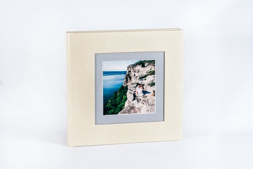 Photobook 30x30 in the &quot;fotobook plus&quot; studio. order at a discount.