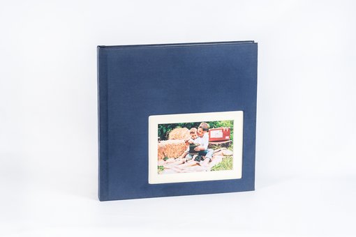 Classic photo book in the studio "Fotobook Plus". Order at a discount.